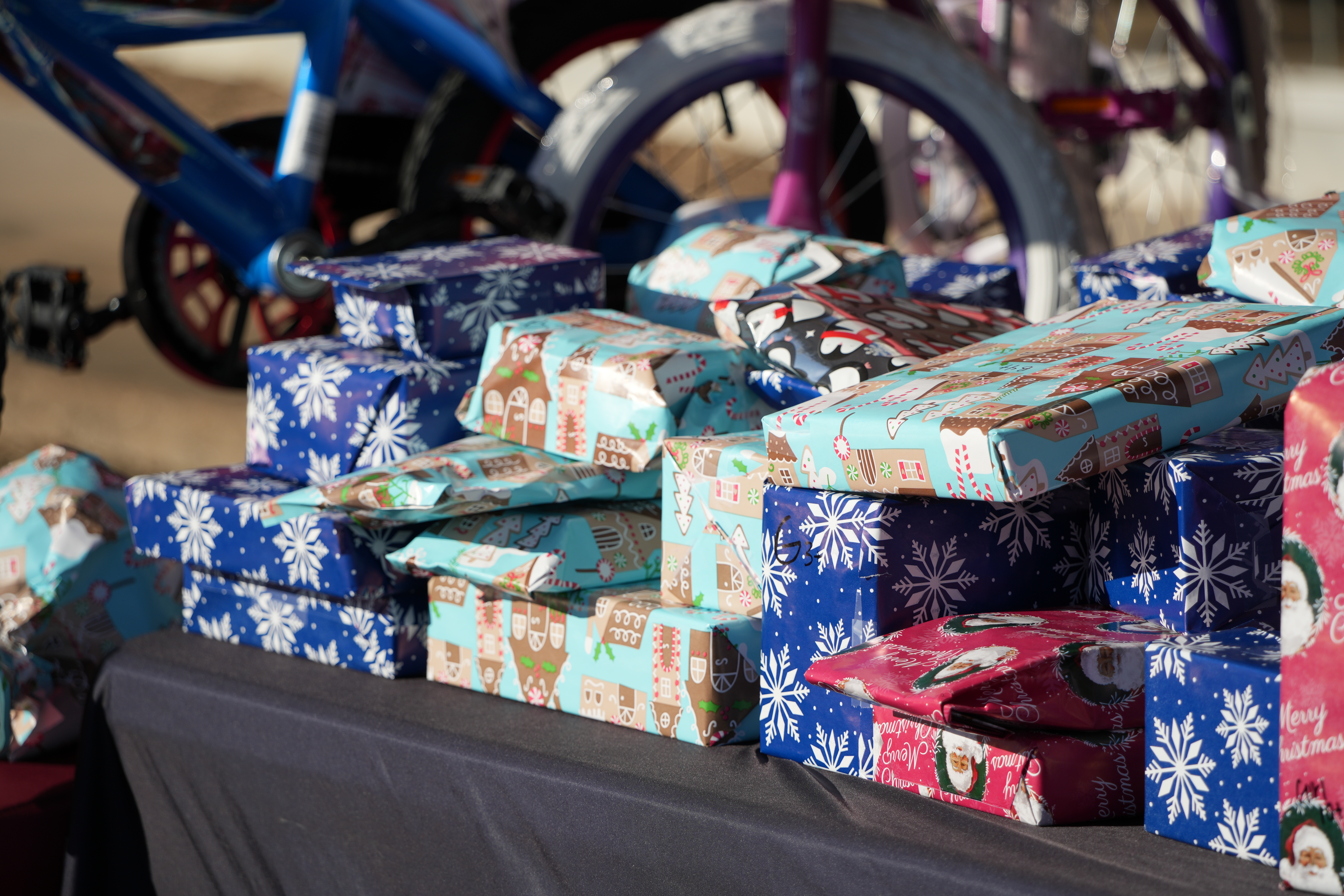 Amtex team members with families at a community event